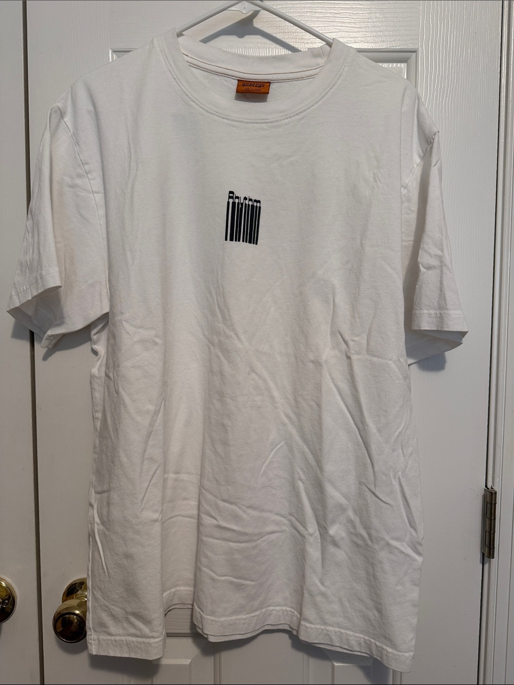 Rhythm. White Short-Sleeve Tee with Small Black Barcode Graphic